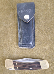 (1) Buck 110 Lockblade Knife, 3-1/2" Blade.