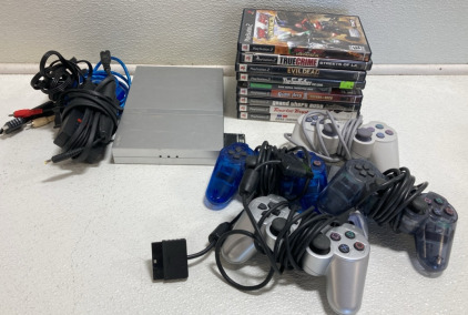 (1) PS2 Game Console w/ (4) Controllers and (9) Games