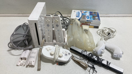 Wii Game Console w/ (3) Controllers and (4) Games