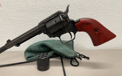 Heritage Rough Rider .22 LR. Caliber Revolver W/ Extra .22 WMR Cylinder And Sock