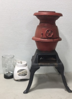 (1) Oster (14) Speed Blender (1) Blender Jar (1) Antique Potbelly wood stove