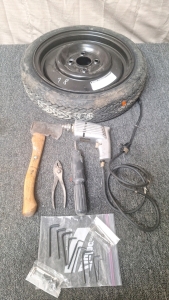 T12/70D15 Spare Tire, Hand Axe, Power Drill & Other Tools..BBFN