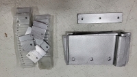 Assortment of nuts, bolts, washers in so sizes in length and width. (10)Rolls of foam adhesive, several steel strapping seals, several aluminum Z clips, electrical straps and screw connectors. Pressure nozzle, (3) spring grips (1) metal hanger strap, seve - 3