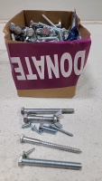 Assortment of nuts, bolts, washers in so sizes in length and width. (10)Rolls of foam adhesive, several steel strapping seals, several aluminum Z clips, electrical straps and screw connectors. Pressure nozzle, (3) spring grips (1) metal hanger strap, seve - 10