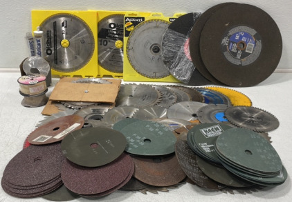 Various Sized Saw Blades, Saw Lubricant, Grinder/ Sanding Disc, & (2) Rolls MIG Wire