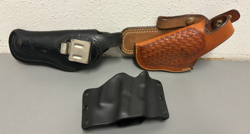 (1) Combat Plastic Stealth Holster, (1) Black Leather Detective Holster, (1) Brown Leather Medium Frame Holster
