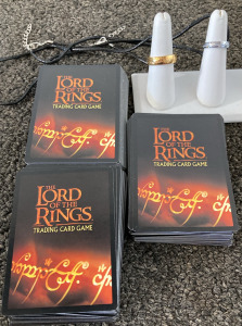 LoTR Trading Card Game & His + Hers “One True Ring “ Replicas On Leather Cord