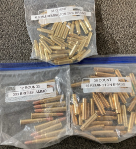 (38) Count 6.8 MM Remington SPC Brass, (12) Rounds 303 British Ammo, (38) Count 35 Remington Brass