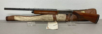 Remington Model 1100 Semi Automatic 12 Gauge Shotgun W/ Leather Gun Case And Manual