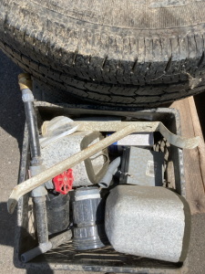 Assortment of Pipe Connectors (2) Goodyear P245/75r16 Tires (1) Spare Tire Hitch Attachment