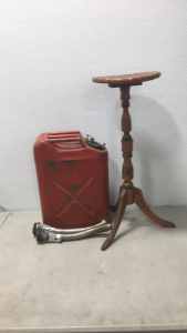 (1) Red Gas Can (2) Gas Can Slouts (1) Wooden Stand