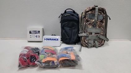 Lowrance Fish finder, Box of Steering Locks, fishing pole rod sleeves and two backpacks