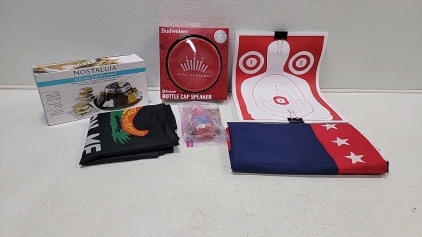 Electric s'mores maker, Bluetooth Budweiser bottle cap speaker, large amount of paper targets, bottle of coyote calling scent