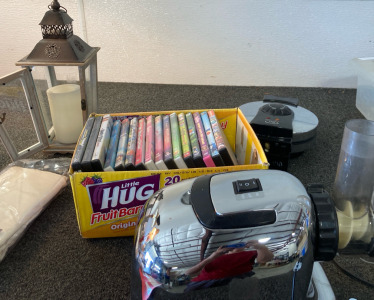 Movies, Waffle Maker, Omega Juice Maker, & Decorative Lantern