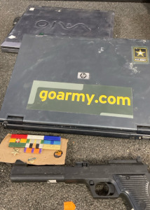 Decorated Laptops, BB Gun, & Military Badges