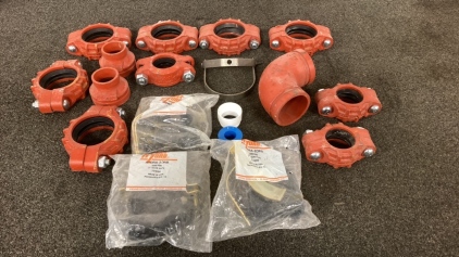 Bucket Of Pipe Couplings And More