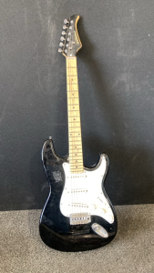 SilverTone 6 String Black & White Guitar.