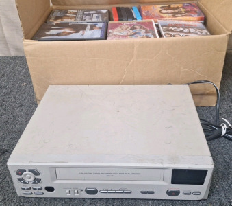 VCR Lapse Recorder and Box of Movies