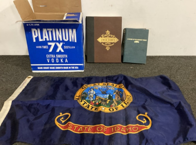 State of Idaho flag and vintage books