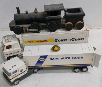 (1) NYLINT CO Napa Auto Parts Semi-Truck Model (1) ERTL Coast to Coast Total Hardware Semi-Truck Model (1) Wood Train and More!