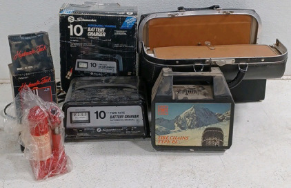 (1) Petersen Hydraulic Jack (1) Schumacher 10amp Battery Charger (1) Tire Chains (1) Vintage Doctors Bag