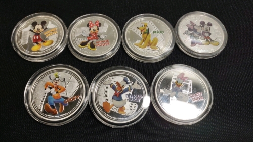 (7) Disney Character Silver Plated Collectable Coins