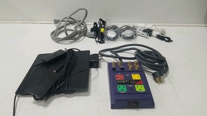 Assorted Power Cables, Chargers, Extension Chord, Dish broadcaster, Power center.