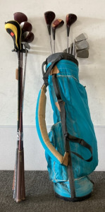 A Variety Of Golf Clubs And Golf Bag