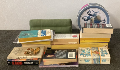 (22) Books, Pyramid Pillow, And Blue Circular Tin