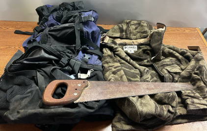 Hunting Jacket, Hunting bag, And Hand Saw