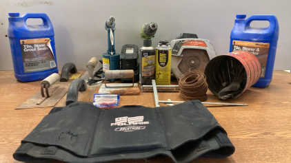 (2) Bottles of Professionals Choice (1) Kawasaki Drill (2) Kawasaki Batteries (5) Scrapers (1) Black & Decker Saw (1) Can of Drill Bits (2) Spools of Wire (1) Clearance/Marker (1) Can of Kwik Foam (1) Can of Great Stuff Pro (1) Polaris Back Thing