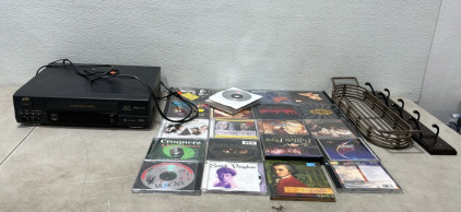 Assorted CDs (1) Coat Rack (1) JVC DA 4 Head VHS HQ (HR-A61U)
