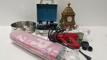 Master Sextant, Decrative sitting clock, wrapped rug, Decrative glass cups, other items