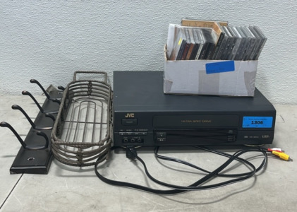 Assorted CD&rsquo;s (1) Coat Rack (1) JVC DA 4Head HQ (HR-A61U)