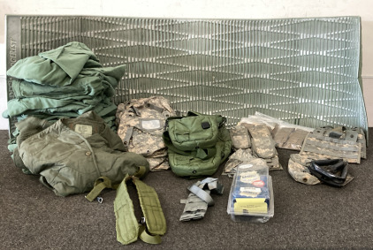 Military Surplus, (1) Sleep Mat, 22 Large Green bags, (9) Small Camo Bags, (18) Variety Mag Holsters, (9) Small Green Bags, (1) Blackhawk Left Handed Holster ( Fits Beretta 92/96), (1) Cold Weather Liner (Size Large). Please Inspect.