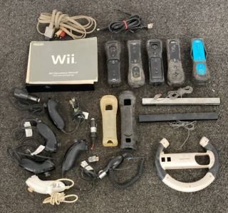 Wii Console, (5) Remotes, (5) Nunchucks, Wheel, And Wires