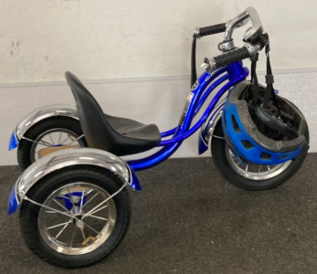 Blue Tricycle And Helmet