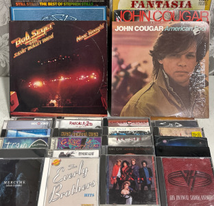 (6) LP Records Includes The Eagles, John Cougar Mellencamp & More (24) CD&rsquo;s Includes Van Halen, Rush, Rascal Flatts, AC/DC, Owl City & More