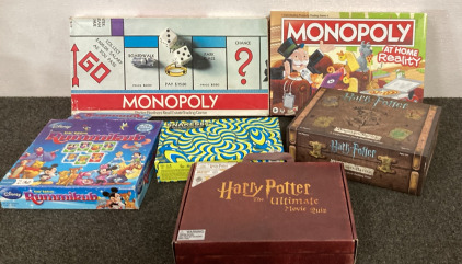 (6) Board Games, Monopoly Original, Monopoly At Home Reality, Rummikub, Snakesss, Harry Potter Hogwarts Battle, Harry Potter The Ultimate Movie Quiz, Please Inspect.