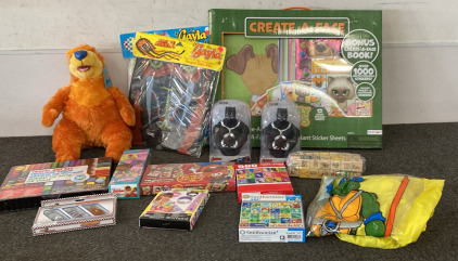 Bear Big Blue House Plush, (2) Kites, (1) Create A Face Activity Set, (1) Travel Art Set, (1) Doc Mcstuffins Memory Match Game, (1) Mr. Potato Head Milk Chocolate Remember Game**Expired** (02/18/2018).(2) Black Panther Coin Bank, (1) 500 Piece Puzzle.(1) 