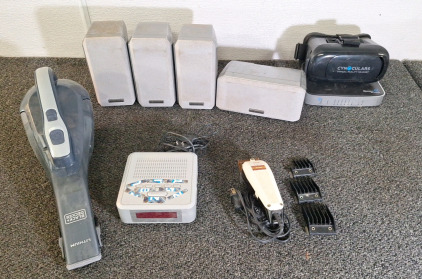 (1) BLACK & DECKER CORDLESS VACUUM, (1) ALARM CLOCK/RADIO, (1) PAIR OF WAHL CLIPPERS & MORE