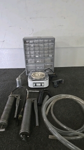 (1) Montgomery Ward Hot Plate (1) Set of Rubber Tubing (2) LubriMatics (1) Smaller Grease Gun (1) Eagle Pump Oiler (1) Gray Organizer (1) Sprayer Nozzle