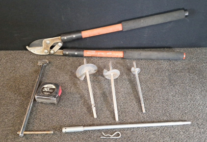 (1) PAIR OF CORONA LIMB LOPPERS, 24" HANDLES, (1) BASIN WRENCH, 14" HANDLE, (1) 30' TAPE MEASURE & (3) DIRT AUGERS W/EXTENSION