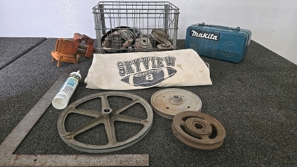 (1) Bin of Pulley Parts (1) Makita Box (1) Vice (1) SkyView Sports Bag (1) Tube of Acrylic Latex Caulk (1) Square
