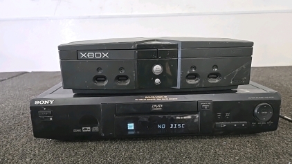 (1) XBox (1) Sony DVD Player