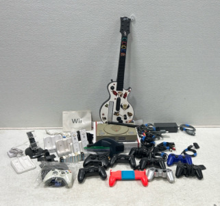 (1) Play station 1 (10) Gaming remotes (5) Wii remote holders/chargers (1) Guitar hero guitar (1) assorted gaming wires