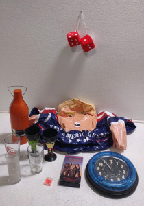 Donald Trump Tube Floaty, Sterling & Noble Clock, "Bod Girls" VHS Tape & More