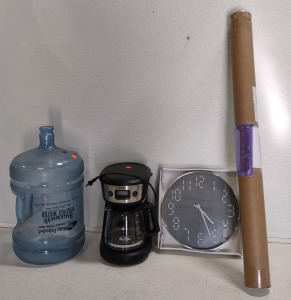 (1) Mr. Coffee Machine, (1) Hangerman Springs Water Bottle, (1) World Map & (1) Gallery Wall Clock