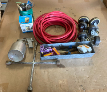 An Assortment of Casters (1) Craftsman Air Hose (1) Paint Sprayer & More