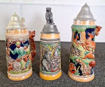 (1) 9" BEER STEIN, MAKRKED GERTZ & (2) 11" BEER STEINS (1) MARKED GIRMSCHE, (1) UNKNOWN MAKER